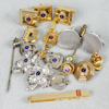 Medaljer, pins, manschettknappar