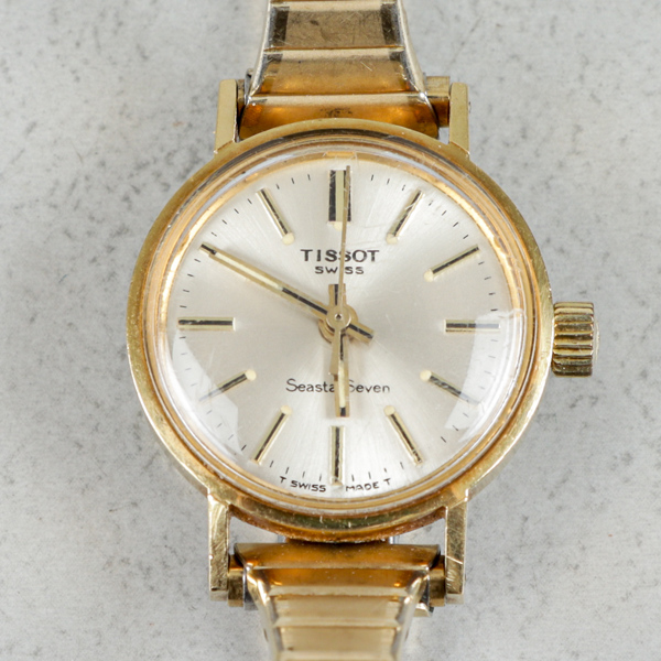 Förtjänstklocka, Tissot, 18k guld, Ø22mm