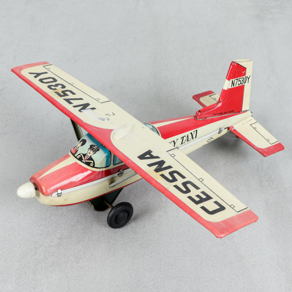 Leksaksflygplan, "Cessna" , litograferad plåt, T.T Japan