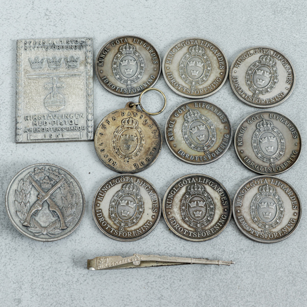 Märken och medaljer, 11st, silver, 189g
