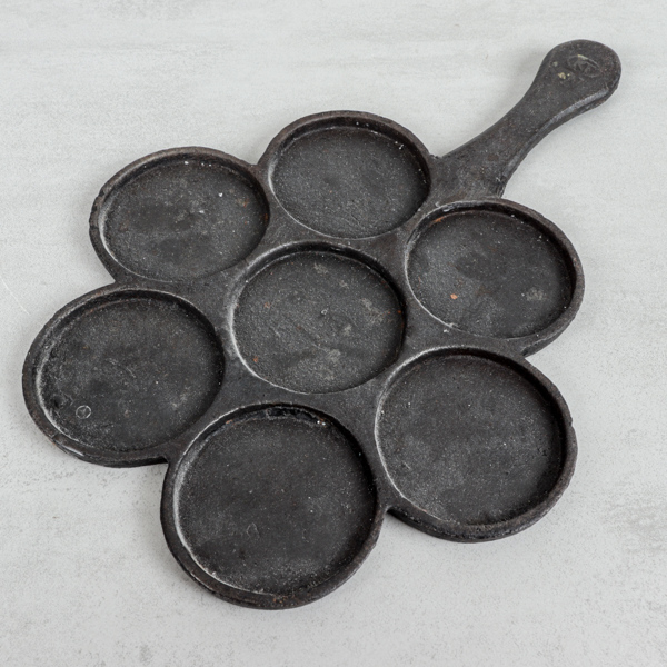 Plattlägg, gjutjärn, märkt "KF"