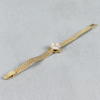 Damarmbandsur, Omega, Boett samt armband i 18k guld, 28.1g