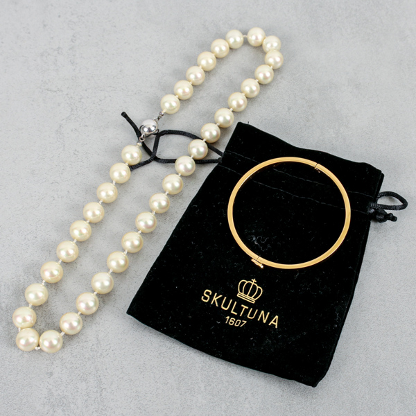 Halsband med silverlås och Armband Skultuna