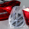 Lyktor, för Audi och Volkswagen, samt emblem, Volkswagen