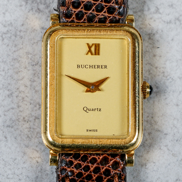 Damarmbandsur, Bucherer, guld 18k, 17x22
